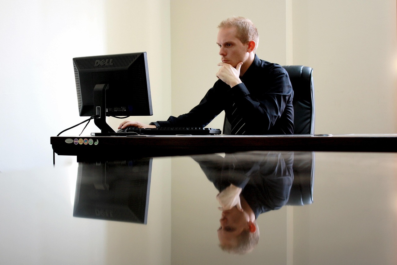 Professional cybersecurity engineers working in a modern security operations center